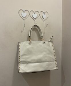 Bolso tachas