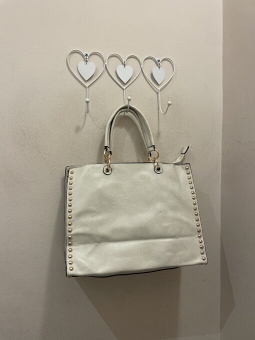 Bolso tachas