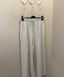 Pantalón tachuelas lateral
