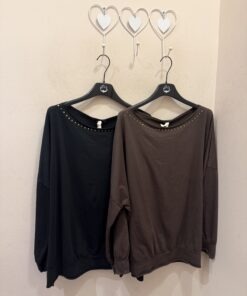 Camiseta murciélago tachas